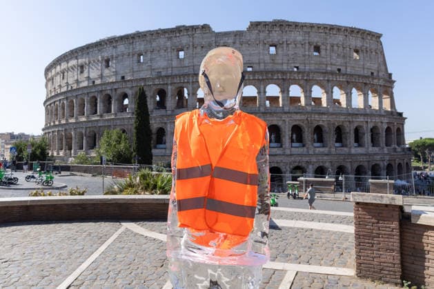 IPA86699882 - Ice Workers flash mob organized by Greenpeace Italy activists near the Colosseum in Rome to mark the European Day for Victims of the Global Climate Crisis  Copyright: xMatteoxNardonex xx 86699882