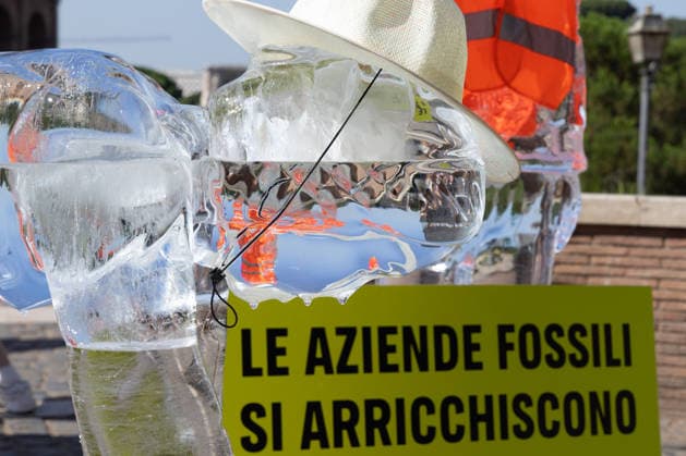 IPA86699885 - Ice Workers flash mob organized by Greenpeace Italy activists near the Colosseum in Rome to mark the European Day for Victims of the Global Climate Crisis  Copyright: xMatteoxNardonex xx 86699885