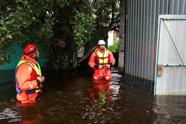 RUSSIA, SVERDLOVSK REGION - JULY 15, 2026: Emergency worker respond to flooding in the village of Zaikovo, southwest of Irbit. Donat Sorokin TASS  95063648