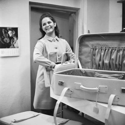 Alzbeta Strkulova, 22, the very first Czechoslovak contestant of a Miss World contest, poses for the photographer in Prague, Czechoslovakia, on November 2, 1967. In the photo, choosing luggage for a trip to London. (CTKxPhoto JanxBarta) CTKPhotoF202604100020001  CTKPhotoF202604100020001