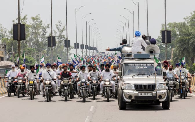 Kisan Mazdoor Sangharsh Committee protests against the proposed Indo- US Trade deal Amritsar, Jul 15 (ANI): Farmers from Kisan Mazdoor Sangharsh Committee take part in a motorcycle protest rally against the proposed Indo- US Trade deal, in Amritsar on Wednesday. (Raminder Pal Singh ANI Photo) Amritsar Punjab India Copyright: xANIx ANI_20260715119