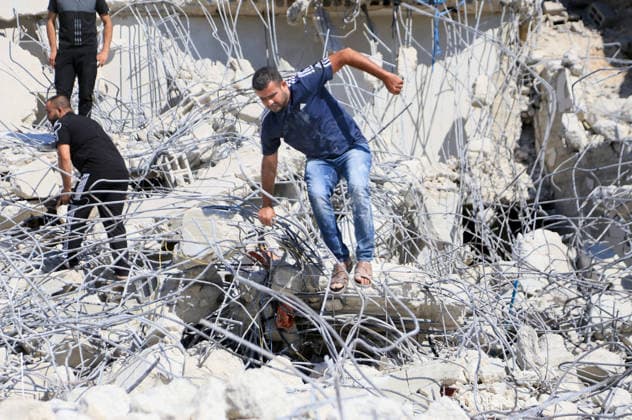 July 15, 2026, Jenin, West Bank, Palestine: Palestinians inspect a house after it was demolished by Israeli bulldozers in the village of Anza, south of Jenin in the West Bank. The Israeli bulldozers demolished the Palestinian home, located in Area B, which is under the administration of the Palestinian Authority headed by Mahmoud Abbas in the West Bank. The Israeli government seeks to seize control of land in the West Bank. Jenin Palestine - ZUMAs197 20260715_aaa_s197_007 Copyright: xNasserxishatyehx