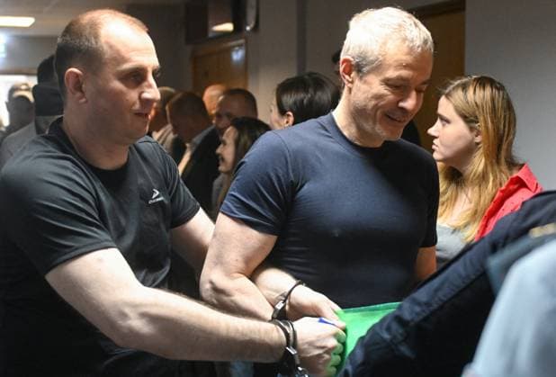 Russia Rusagro Founder Fraud Trial 9205854 15.07.2026 Founder of Russian agricultural giant Rusagro Group Vadim Moshkovich, charged with large-scale fraud and organising abuse of office in connection with the corruption case against the company, and former governor of Tambov Region, Sergei Ivanov, charged with accepting a large bribe, are escorted by police before a hearing at the Zamoskvoretsky District Court in Moscow, Russia. Mikhail Voskresenskiy Sputnik Moscow Russia  Copyright: xMikhailxVoskresenskiyx