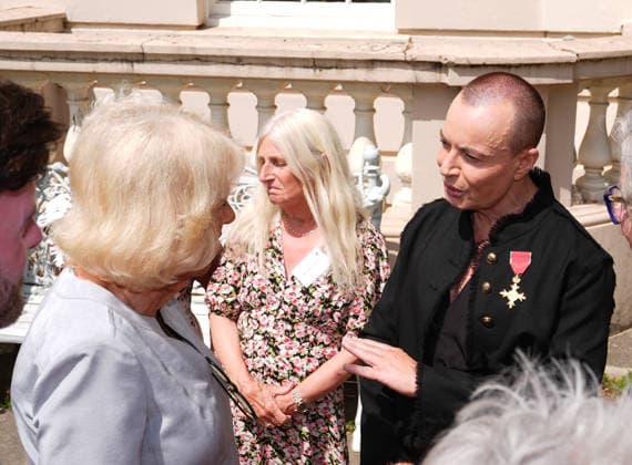 Royal Osteoporosis Society reception Queen Camilla, President of the Royal Osteoporosis Society, speaks with designer Julien Macdonald a reception to mark 40 years of the charity, at Clarence House, London. The Queen has championed the work of the Royal Osteoporosis Society since 1994, after seeing her own mother suffering with the disease, which resulted in her early death at the age of 72. Picture date: Wednesday July 15, 2026., Credit:Aaron Chown PA ROTA - B68 Avalon UK, London  Copyright: xAaronxChownx xPAxROTAx-xB68x xAvalonx 1116687509