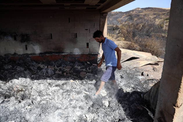 Mountain fires in Bejaia and Setif caused property damage in the village of Talat Izar Beni Maouche, in Bejaia, Algeria, on July 15, 2026, Due to the recent fires, according to a report from civil protection, the fires are under control. Photo by Billel Bensalem, APP, Bejaia, Algeria Copyright: xAPPxAlgeriexPressxPhotosxBillelxBensalemx xAPPx IMG_6114