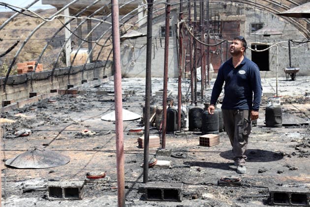 Mountain fires in Bejaia and Setif caused property damage in the village of Talat Izar Beni Maouche, in Bejaia, Algeria, on July 15, 2026, Due to the recent fires, according to a report from civil protection, the fires are under control. Photo by Billel Bensalem, APP, Bejaia, Algeria Copyright: xAPPxAlgeriexPressxPhotosxBillelxBensalemx xAPPx IMG_6185