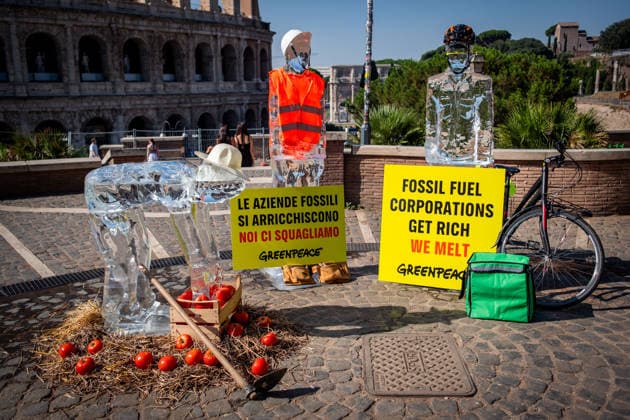 July 15, 2026, Rome, Rm, Italy: On the occasion of the European Day in remembrance of the victims of the global climate crisis, Greenpeace Italy activists let three ice statues melt in the sun near the Colosseum to denounce the impact of the climate crisis on workers. The statues depicted a farm worker, a construction worker, and a delivery driver, among the groups most exposed to heat waves. Rome Italy - ZUMAg256 20260715_znp_g256_010 Copyright: xMarcoxDixGianvitox
