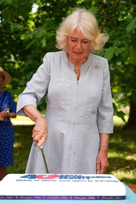 Royal Osteoporosis Society reception Queen Camilla, President of the Royal Osteoporosis Society, cuts a cake as she hosts a reception to mark 40 years of the charity, at Clarence House, London. The Queen has championed the work of the Royal Osteoporosis Society since 1994, after seeing her own mother suffering with the disease, which resulted in her early death at the age of 72. Picture date: Wednesday July 15, 2026., Credit:Aaron Chown PA ROTA - B68 Avalon UK, London  Copyright: xAaronxChownx xPAxROTAx-xB68x xAvalonx 1116695024
