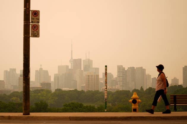 Forest fires smoke blankets Toronto TORONTO, CANADA - JULY 15 : The hazy Toronto skyline is seen as smoke from wildfires continue to impact air quality in Toronto, Ontario on July 15, 2026. Environment Canada issued an air quality warning for Toronto due to wildfire smoke. Mert Alper Dervis Anadolu Ontario Canada. Editorial use only. Please get in touch for any other usage.  Copyright: x2026xAnadoluxMertxAlperxDervisx
