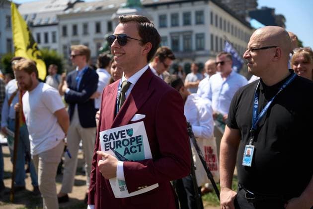July 15, 2026, Brussels, Belgium: BRUSSELS, BELGIUM Ã¢â‚¬ JULY 2026: Far-right activists Martin Sellner, Eva Vlaardingerbroek, Dries Van Langenhove, Andrea Ballarati and Lucy White joined MEPs Dominik TarczyAski, Sebastian Tynkkynen, Geadis Geadi and 200 participants at the Save Europe Act rally in Place du Luxembourg on Wednesday. They later marched to the entrance of the European Parliament, where organizers symbolically delivered more than 500,000 printed signatures supporting their Save Europe Act initiative in a wheelbarrow. JNA Press. Brussels Belgium - ZUMAq101 20260715_zna_q101_159 Copyright: xRaduxIonescux