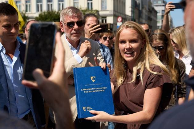 July 15, 2026, Brussels, Belgium: BRUSSELS, BELGIUM Ã¢â‚¬ JULY 2026: Far-right activists Martin Sellner, Eva Vlaardingerbroek, Dries Van Langenhove, Andrea Ballarati and Lucy White joined MEPs Dominik TarczyAski, Sebastian Tynkkynen, Geadis Geadi and 200 participants at the Save Europe Act rally in Place du Luxembourg on Wednesday. They later marched to the entrance of the European Parliament, where organizers symbolically delivered more than 500,000 printed signatures supporting their Save Europe Act initiative in a wheelbarrow. JNA Press. Brussels Belgium - ZUMAq101 20260715_zna_q101_184 Copyright: xRaduxIonescux