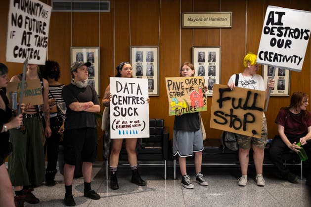 July 15, 2026, Hamilton, On, Canada: People in opposition to AI data centres demonstrate outside the council chambers at city hall in Hamilton, Wednesday, July 15, 2026. Hamilton Canada  - ZUMAc35_ 20260715_zaf_c35_025 Copyright: xNickxIwanyshynx