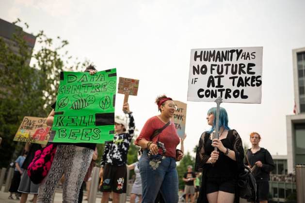 July 15, 2026, Hamilton, On, Canada: People in opposition to AI data centres demonstrate outside city hall in Hamilton, Wednesday, July 15, 2026. Hamilton Canada  - ZUMAc35_ 20260715_zaf_c35_030 Copyright: xNickxIwanyshynx