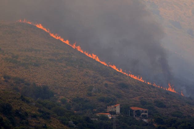Italy battles extreme heat and wildfires PALERMO, ITALY - JULY 15: A view of a wildfire that broke out in the maquis vegetation on the slopes of Mount Longa near Palermo, Sicily, Italy, on July 15, 2026. The blaze spread rapidly due to strong winds as firefighters battled the fire with firefighting aircraft and helicopters in an effort to bring it under control. Alberto Lo Bianco Anadolu Palermo Italy. Editorial use only. Please get in touch for any other usage.  Copyright: x2026xAnadoluxAlbertoxLoxBiancox