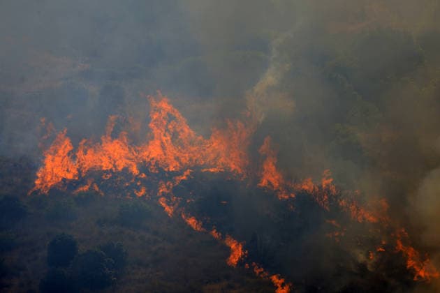 Italy battles extreme heat and wildfires PALERMO, ITALY - JULY 15: A view of a wildfire that broke out in the maquis vegetation on the slopes of Mount Longa near Palermo, Sicily, Italy, on July 15, 2026. The blaze spread rapidly due to strong winds as firefighters battled the fire with firefighting aircraft and helicopters in an effort to bring it under control. Alberto Lo Bianco Anadolu Palermo Italy. Editorial use only. Please get in touch for any other usage.  Copyright: x2026xAnadoluxAlbertoxLoxBiancox
