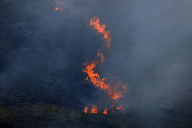 Italy battles extreme heat and wildfires PALERMO, ITALY - JULY 15: A view of a wildfire that broke out in the maquis vegetation on the slopes of Mount Longa near Palermo, Sicily, Italy, on July 15, 2026. The blaze spread rapidly due to strong winds as firefighters battled the fire with firefighting aircraft and helicopters in an effort to bring it under control. Alberto Lo Bianco Anadolu Palermo Italy. Editorial use only. Please get in touch for any other usage.  Copyright: x2026xAnadoluxAlbertoxLoxBiancox