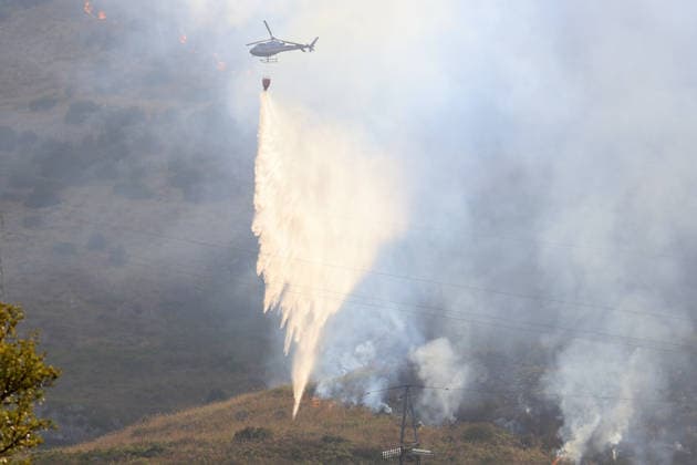 Italy battles extreme heat and wildfires PALERMO, ITALY - JULY 15: Firefighters battle the fire with firefighting aircraft and helicopters in an effort to bring it under control as a wildfire that broke out in the maquis vegetation on the slopes of Mount Longa spreading rapidly due to strong winds near Palermo, Sicily, Italy, on July 15, 2026. Alberto Lo Bianco Anadolu Palermo Italy. Editorial use only. Please get in touch for any other usage.  Copyright: x2026xAnadoluxAlbertoxLoxBiancox