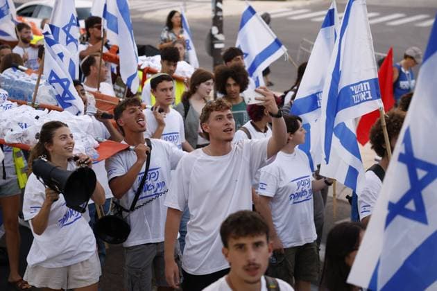 July 15, 2026, Jerusalem, Israel: JERUSALEM Ã¢â‚¬ JULY 15, 2026: Hundreds of teenagers and young adults march from Paris Square to the Knesset during a protest demanding equal military service obligations for all Israeli citizens, including the ultra-Orthodox community, in Jerusalem on July 15, 2026. Organized by the Hanaton Mechina in the Galilee, the demonstration was held in response to proposed legislation expanding military draft exemptions and suspending the arrest of draft evaders. Participants, including pre-military academy students, military service candidates and youth movement members, carried a symbolic stretcher before holding a rally outside the Knesset. Hilel Ben or JNA PRESS Jerusalem Israel  - ZUMAq101 20260715_zna_q101_193 Copyright: xHilelxBenxOrx