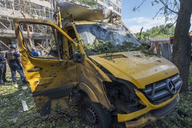 Russian guided bomb strike damages industrial zone in Kharkiv KHARKIV, UKRAINE - JULY 15: The aftermath of a strike by a Russian guided aerial bomb is seen in an industrial zone in Kharkiv, Ukraine, on July 15, 2026. The attack caused severe damage to industrial buildings housing woodworking, footwear and clothing manufacturing facilities, as well as other civilian enterprises. Seven vehicles parked near the impact site were also damaged. According to local authorities, eight civilians were injured in the strike. Men aged 44, 49, 50 and 57, along with women aged 31, 51 and 60, were hospitalized with injuries of varying severity. A 51-year-old man who suffered cuts from shattered glass received medical treatment at the scene. Serhii Masin  Copyright: x2026xAnadoluxSerhiixMasinx
