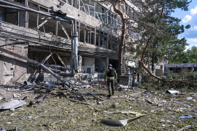 Russian guided bomb strike damages industrial zone in Kharkiv KHARKIV, UKRAINE - JULY 15: The aftermath of a strike by a Russian guided aerial bomb is seen in an industrial zone in Kharkiv, Ukraine, on July 15, 2026. The attack caused severe damage to industrial buildings housing woodworking, footwear and clothing manufacturing facilities, as well as other civilian enterprises. Seven vehicles parked near the impact site were also damaged. According to local authorities, eight civilians were injured in the strike. Men aged 44, 49, 50 and 57, along with women aged 31, 51 and 60, were hospitalized with injuries of varying severity. A 51-year-old man who suffered cuts from shattered glass received medical treatment at the scene. Serhii Masin  Copyright: x2026xAnadoluxSerhiixMasinx