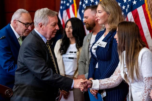 Senate Minority Leader Chuck Schumer, D-NY, and Senate Minority Whip Dick Durbin, D-IL, greet survivors of convicted sex offender Jeffrey Epstein before a press conference at the U.S. Capitol in Washington, DC on Wednesday, June 15, 2026. Epstein survivors and survivors family spoke against Todd Blanche s nomination to be U.S. Attorney General following his Senate Judiciary Committee nomination hearing.  WAP20260715497 BONNIExCASH