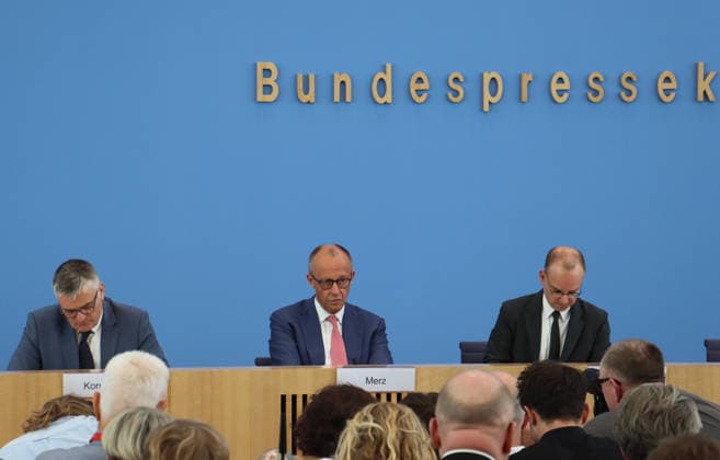 (260715) -- BERLIN, July 15, 2026 -- German Chancellor Friedrich Merz (C) speaks during his summer press conference in Berlin, Germany on July 15, 2026. German Chancellor Friedrich Merz said on Wednesday that he does not want the United States to interfere in German elections. ) GERMANY-BERLIN-CHANCELLOR-PRESS CONFERENCE LixHanlin 