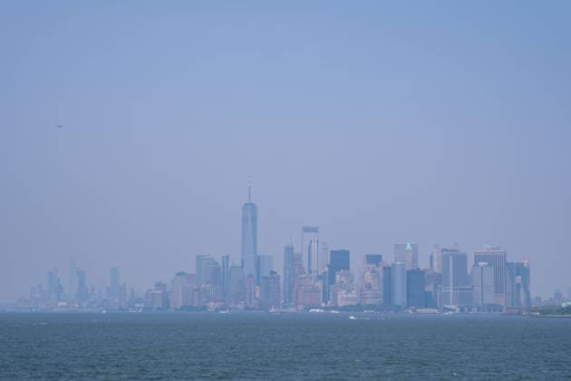July 15, 2026, New York, New York, USA: Hazy skyline of Manhattan from the Staten Island Ferry as smoke from the Canadian wildfires moves over the city...Both heat and Air Quality Health Advisories are in effect New York City as smoke from Canadian wildfires coincide with temperatures expected to reach near100Ã‚Â°F as a heatwave continues. New York USA  - ZUMAp288 20260715_znp_p288_026 Copyright: xSyndixPilarx