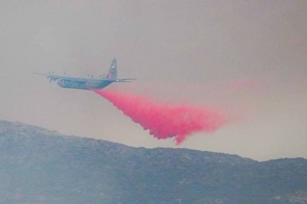 July 15, 2026, Boulevard, California, United States: An air tanker drops fire retardant over the Thorn Fire..The Thorn Fire burns near Buckthorn Trail and Clover Trail in the Boulevard Campo area of southeastern San Diego County on Wednesday, July 15, 2026. Fueled by hot, dry conditions, the wildfire spreads rapidly, prompts evacuation orders and warnings, temporarily closes portions of Interstate 8, and draws a large response from Cal Fire and local agencies. Firefighters on the ground, supported by air tankers and helicopters, work to slow the fire s advance and protect nearby homes and infrastructure as officials monitor changing fire conditions. Boulevard United States  - ZUMAs197 20260715_aaa_s197_306 Copyright: xWaixLeexMichaelxHox