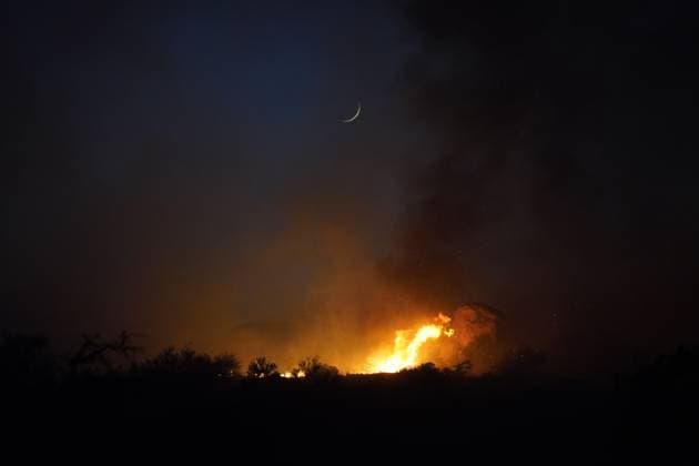 July 15, 2026, Boulevard, California, United States: Smoke and flame are seen along the road..The Thorn Fire burns near Buckthorn Trail and Clover Trail in the Boulevard Campo area of southeastern San Diego County on Wednesday, July 15, 2026. Fueled by hot, dry conditions, the wildfire spreads rapidly, prompts evacuation orders and warnings, temporarily closes portions of Interstate 8, and draws a large response from Cal Fire and local agencies. Firefighters on the ground, supported by air tankers and helicopters, work to slow the fire s advance and protect nearby homes and infrastructure as officials monitor changing fire conditions. Boulevard United States  - ZUMAs197 20260715_aaa_s197_307 Copyright: xWaixLeexMichaelxHox