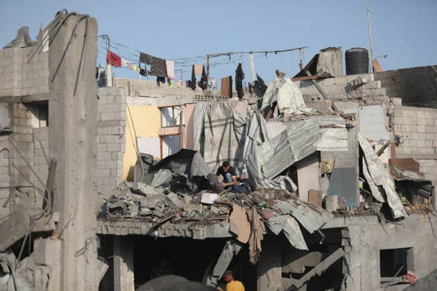 Palestinians inspect damage after Israeli strike in al-Bureij camp Palestinians inspect the damage after an Israeli airstrike targeted a house following an evacuation warning in the western area of al-Bureij refugee camp, in the central Gaza Strip, on July 16, 2026. The strike caused extensive damage to the targeted house and surrounding residential buildings. Photo by Moiz Salhi apaimages Nusairat Gaza Strip Palestinian Territory 160726_Bureij_MS_00(23) Copyright: xapaimagesxMoizxSalhixx xapaimagesx
