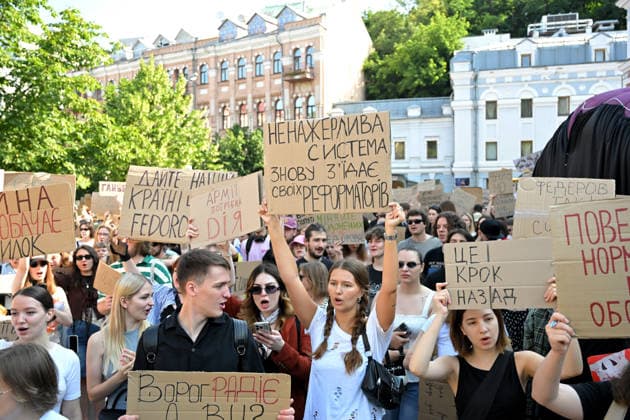Activists hold placards during a rally against the dismissal of Ukrainian Defence Minister Mykhailo Fedorov, Kyiv, Ukraine, July 16, 2026. On July 14, the Ukrainian Parliament supported the resignation of Prime Minister Yuliia Svyrydenko, leading to the resignation of the Cabinet of Ministers. (Photo by Yevhen Kotenko Ukrinform) Protest action against dismissal of Ukrainian Defence Minister Mykhailo Fedorov in Kyiv  Copyright: xYevhenxKotenkox