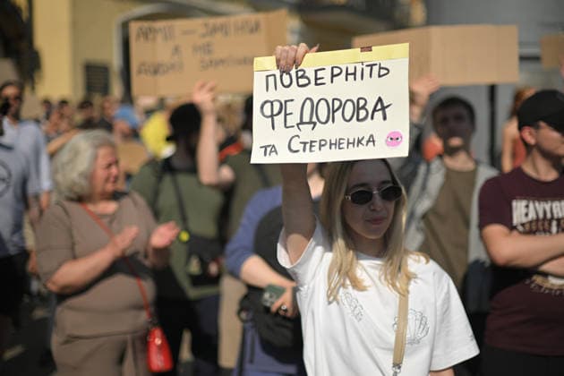 A demonstrator holds a placard reading Bring Fedorov and Sternenko Back during a rally against the dismissal of Ukrainian Defence Minister Mykhailo Fedorov, Kyiv, Ukraine, July 16, 2026. On July 14, the Ukrainian Parliament supported the resignation of Prime Minister Yuliia Svyrydenko, leading to the resignation of the Cabinet of Ministers. (Photo by Yevhen Kotenko Ukrinform) Protest action against dismissal of Ukrainian Defence Minister Mykhailo Fedorov in Kyiv  Copyright: xYevhenxKotenkox