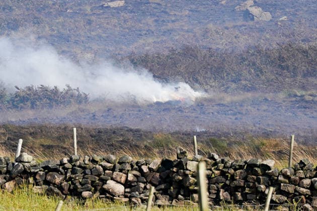 July 16, 2026, Glossop, Derbyshire, UK: Glossop, UK. Firefighters tackle a massive moorland wildfire on Tintwistle Moor in Glossop, Derbyshire. Glossop UK  - ZUMAl94_ 20260716_zaf_l94_015 Copyright: xIoannisxAlexopoulosx
