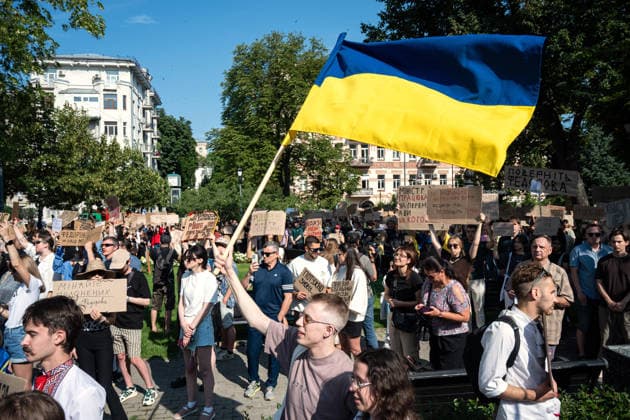 A demonstrator waves a Ukrainian flag during a rally against the dismissal of Ukrainian Defence Minister Mykhailo Fedorov, Kyiv, Ukraine, July 16, 2026. On July 14, the Ukrainian Parliament supported the resignation of Prime Minister Yuliia Svyrydenko, leading to the resignation of the Cabinet of Ministers. (Photo by Danylo Antoniuk Ukrinform) Protest action against dismissal of Ukrainian Defence Minister Mykhailo Fedorov in Kyiv  Copyright: xDanyloxAntoniukx