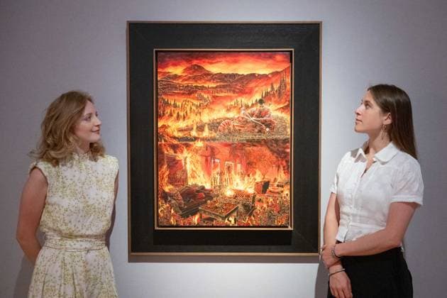 July 16, 2026, London, England, United Kingdom: Christie s staff stand next to Raqib Shaw s When the Thing with Feathers Turned Red (after Tintoretto), 2021-2022, during a preview of The Meeting Ground: Scenes from the KNMA Collection exhibition at Christie s in London, Thursday, July 16, 2026. Presented in collaboration with the Kiran Nadar Museum of Art (KNMA), the exhibition showcases modern and contemporary South Asian art from the museum s collection. London United Kingdom - ZUMAk172 20260716_zip_k172_002 Copyright: xThomasxKrychx