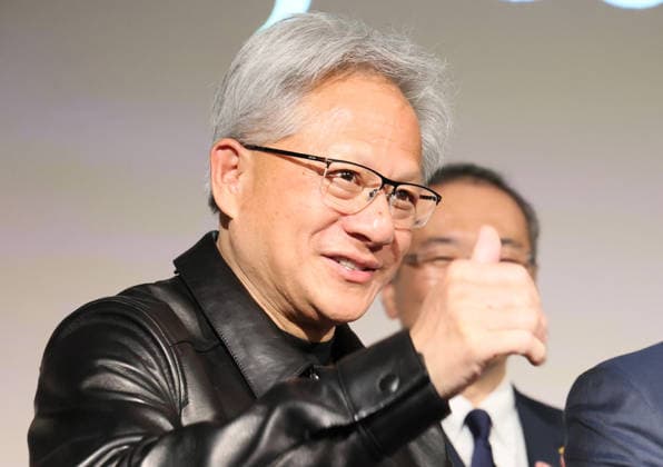 July 16, 2026, Tokyo, Japan - American AI chip maker Nvidia founfer and CEO Jensen Huang gives a thumb-up at a press conference as Japanese three robotics companies, Fanuc, Yaskawa Electric and Kawasaki Heavy Industries begin business collaboration with Nvidia and computer giant Fujitsu in the field of the physical AI in Tokyo on Thursday, July 16, 2026. (photo by Yoshio Tsunoda AFLO)  aflo_338196749