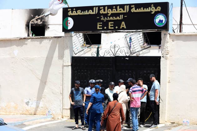 Fire that ravaged an orphanage in Mohammadia, Algeria Police officers stand guard after a fire that ravaged an orphanage in Mohammadia, a suburb of Algiers, Algeria, on July 16, 2026. At least 11 children died and 19 others were injured in the fire that broke out on the morning of July 16, according to the Algerian Civil Protection Agency. Photo by Billel Bensalem, APP, Algiers, Algeria Copyright: xAPPxAlgeriexPressxPhotosxBillelxBensalemx xAPPx IMG_6235