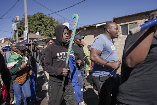 Anti-migrant group holds protest in Johannesburg JOHANNESBURG, SOUTH AFRICA - JULY 16: An anti-migrant group of dozens of people hold a protest in the Alexandra township of Johannesburg, South Africa on July 16, 2026. While some of the demonstrators carried sticks, security forces take precautions along the march route. Ihsaan Haffejee Anadolu Johannesburg South Africa. Editorial use only. Please get in touch for any other usage.  Copyright: x2026xAnadoluxIhsaanxHaffejeex