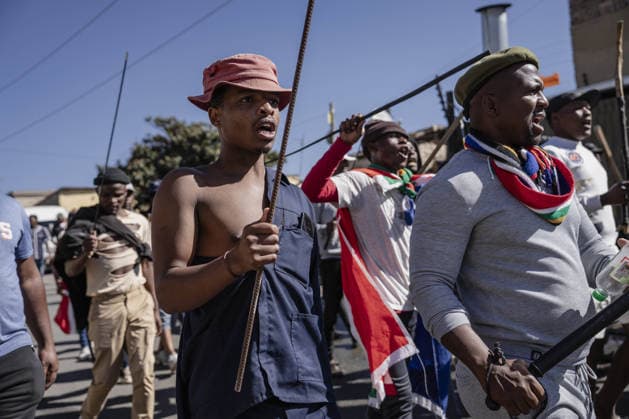 Anti-migrant group holds protest in Johannesburg JOHANNESBURG, SOUTH AFRICA - JULY 16: An anti-migrant group of dozens of people hold a protest in the Alexandra township of Johannesburg, South Africa on July 16, 2026. While some of the demonstrators carried sticks, security forces take precautions along the march route. Ihsaan Haffejee Anadolu Johannesburg South Africa. Editorial use only. Please get in touch for any other usage.  Copyright: x2026xAnadoluxIhsaanxHaffejeex
