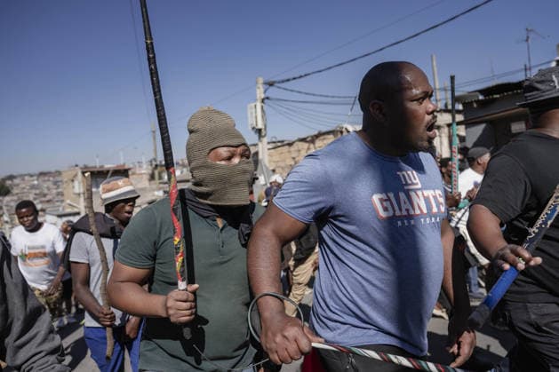 Anti-migrant group holds protest in Johannesburg JOHANNESBURG, SOUTH AFRICA - JULY 16: An anti-migrant group of dozens of people hold a protest in the Alexandra township of Johannesburg, South Africa on July 16, 2026. While some of the demonstrators carried sticks, security forces take precautions along the march route. Ihsaan Haffejee Anadolu Johannesburg South Africa. Editorial use only. Please get in touch for any other usage.  Copyright: x2026xAnadoluxIhsaanxHaffejeex