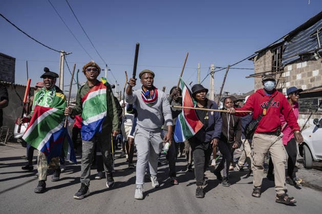 Anti-migrant group holds protest in Johannesburg JOHANNESBURG, SOUTH AFRICA - JULY 16: An anti-migrant group of dozens of people hold a protest in the Alexandra township of Johannesburg, South Africa on July 16, 2026. While some of the demonstrators carried sticks, security forces take precautions along the march route. Ihsaan Haffejee Anadolu Johannesburg South Africa. Editorial use only. Please get in touch for any other usage.  Copyright: x2026xAnadoluxIhsaanxHaffejeex