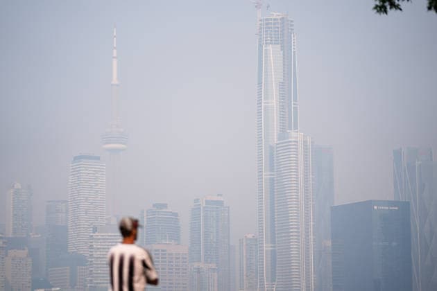 Forest Fires Smoke Blankets Toronto TORONTO, CANADA - JULY 16 : The hazy Toronto skyline is seen as smoke from wildfires continue to impact air quality in Toronto, Ontario on July 16, 2026. Smoke from wildfires in northwestern Ontario has moved into parts of the province, causing very poor air quality and reduced visibility, prompting Environment Canada to issue a high-level air quality alert Wednesday. Mert Alper Dervis Anadolu Ontario Canada. Editorial use only. Please get in touch for any other usage.  Copyright: x2026xAnadoluxMertxAlperxDervisx