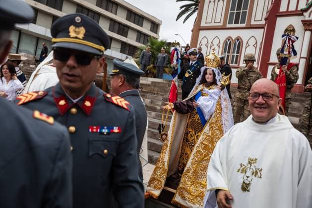 July 16, 2026, Arica, Chile: ARICA, CHILE Ã¢â‚¬ JULY 2026: Chilean soldiers carry an image of the Virgen del Carmen from the foot of the steps into San Marcos Cathedral, where it will remain for worshippers to venerate over the following days, while a Catholic priest looks on. This year marks 100 years since the Church crowned the Virgen del Carmen, Patroness of Chile. Ibar Silva JNA Press. Arica Chile - ZUMAq101 20260716_zna_q101_065 Copyright: xIbarxFelipexSilvaxCanalesx
