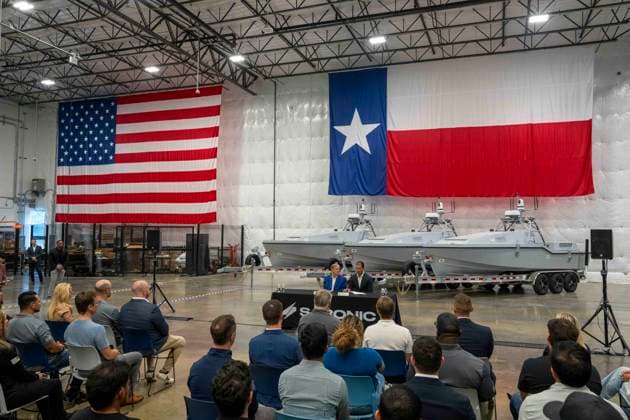 July 16, 2026, Austin, Tx, USA: Texas Governor GREG ABBOTT announces with Saronic CEO DINO MAVROOKAS the expansion to south Texas of the ship and drone boat manufacturer Saronic to a 1,000 acre site at the Port of Brownsville. The Saronic Corsair in the background were the type of drones used to rescue downed U.S. pilots in the Gulf of Oman and attack naval facilities in Iraq. Austin USA  - ZUMAd150 20260716_znp_d150_001 Copyright: xBobxDaemmrichx