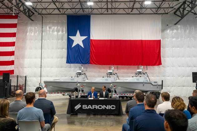 July 16, 2026, Austin, Tx, USA: Texas Governor GREG ABBOTT announces with Saronic CEO DINO MAVROOKAS the expansion to south Texas of the ship and drone boat manufacturer Saronic to a 1,000 acre site at the Port of Brownsville. The Saronic Corsair in the background were the type of drones used to rescue downed U.S. pilots in the Gulf of Oman and attack naval facilities in Iraq. Austin USA - ZUMAd150 20260716_znp_d150_002 Copyright: xBobxDaemmrichx