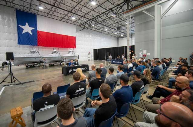 July 16, 2026, Austin, Tx, USA: Texas Governor GREG ABBOTT announces with Saronic CEO DINO MAVROOKAS the expansion to south Texas of the ship and drone boat manufacturer Saronic to a 1,000 acre site at the Port of Brownsville. The Saronic Corsair in the background were the type of drones used to rescue downed U.S. pilots in the Gulf of Oman and attack naval facilities in Iraq. Austin USA  - ZUMAd150 20260716_znp_d150_020 Copyright: xBobxDaemmrichx