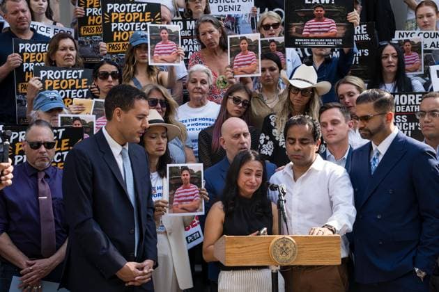 July 16, 2026, New York, New York, USA: The City Council held a hearing to consider a bill, known as RomanchÃ¢â‚¬â ¢s Law, that would phase out and eventually ban horse-drawn carriages. Romanch Mahajan s aunt and uncle spoke at the rally and testified in support of the bill...The bill is named after the 18-year-old tourist from India who was killed last month when he was thrown from a runaway carriage in Central Park after the horse was spooked. New York USA - ZUMAs142 20260716_fap_s142_019 Copyright: xNancyxSieselx