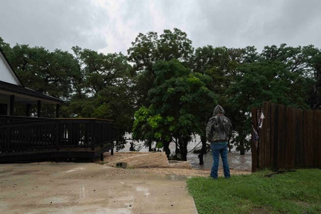 July 16, 2026: An onlooker watches as the Guadalupe River continues to rise after more rain. Center Point, Texas. CSM Center Point United States of America - ZUMAc04_ 1080158477st Copyright: xMarioxCantux