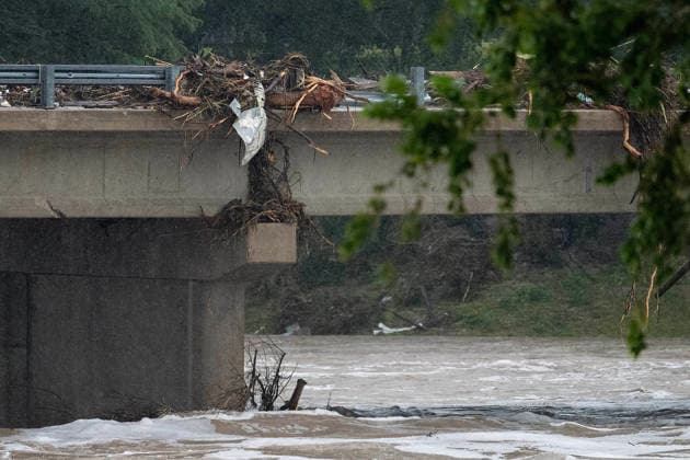 July 16, 2026: The Center Point bridge is closed to traffic due to debris and rising waters, only First Responders can cross as the Guadalupe River contines to rise. Center Point, Texas. CSM. Center Point United States of America - ZUMAc04_ 1080158508st Copyright: xMarioxCantux