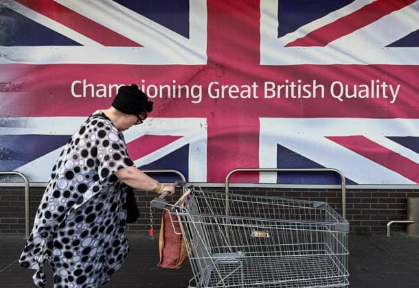 RECORD DATE NOT STATED 270727.jpg A woman pushes a trolley outside a supermarket in Britain on Thursday July 16, 2026. The UK s economy returned to growth in May, but the expansion was modest as businesses were affected by the impact of the Iran war. (Jimmy Lau EYEPRESS) EDITORIAL USE ONLY  Copyright: xx 270727 x eyepress127273